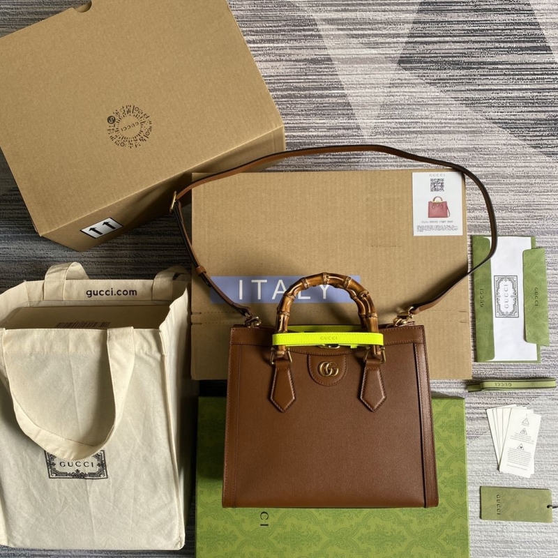 G*u*i top handle bags